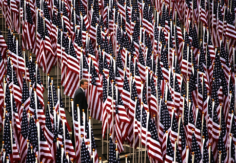 Pictorial 1st Place -  LCpl. Bryan G. Carfrey: Spectators were able to walk through the Healing Field flag display near the Pentagon Memorial prior to the dedication ceremony Sept. 11. The flag display was sponsored by the nonprofit Healing Field Foundation. Each flag represents someone who lost their lives on Sept. 11, 2001.