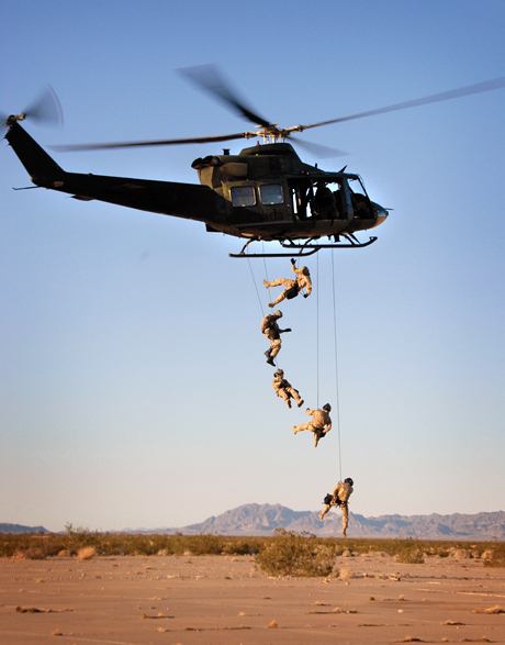 The Norman Hatch Combat Photography Award Honorable Mention - LCpl. Gregory Aalto: Canadian Army Special Forces soldiers rappel from a CH-146 during training Tuesday in Blythe, Calif. The 427 Special Operations Aviation Squadron, based out of Canadian Forces Base Petawawa, Ontario, is here for a month to train in Yuma’s desert climate.