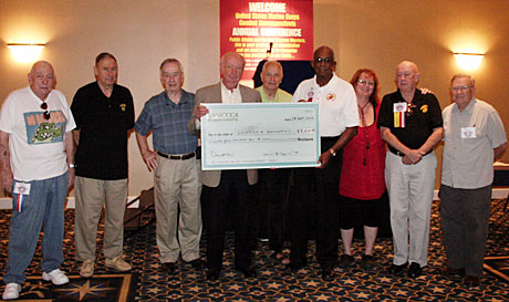 Florida Chapter members at the Annual Business Meeting donate $8,510 to the USMCCCA Foundation.