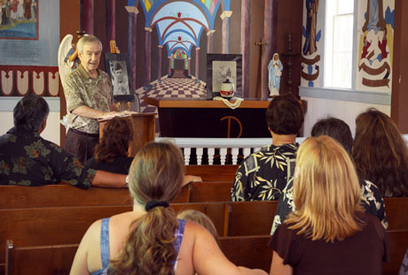 Jack Paxton, Executive Director, USMCCCA gives the eulogy for Jack Lewis at the Star of the Sea Church at Kalapana, HI. (Photo by Sgt. Juan D. Alfonso)