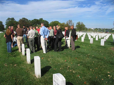 MGySgt Phil Mehringer at grave of Col. Ortiz Peter J. Ortiz, Arlington National Cemetary.
