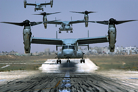 Open Photography Honorable Mention - SSgt. Bobbie Bryant:  MV-22 Ospreys with Marine Medium Tiltrotor Squadron 162, Marine Aircraft Group 16, 3rd Marine Aircraft Wing (Forward), land at an airport in Amman, Jordan, July 22. Four aircraft from the squadron transported Senators Barack Obama (D-IL), Jack Reed (D-RI), and Chuck Hagel (R-Neb) from al-Anbar province, Iraq to Jordan July 22.