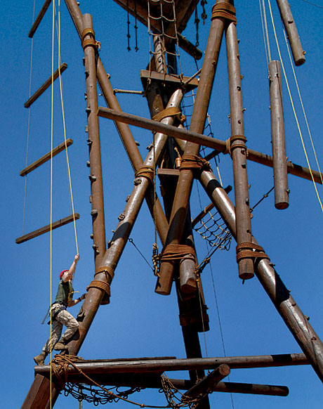 1st Place Contribution by a Contractor/Stringer Photographer by Joel C. Guenther:  Marines overcome obstacles at Darton Challenge Course.